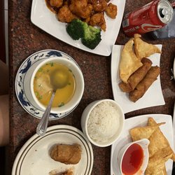 Orange Chicken, Wonton Soup, 8 Piece Crab Puff, 1 Piece Egg Roll