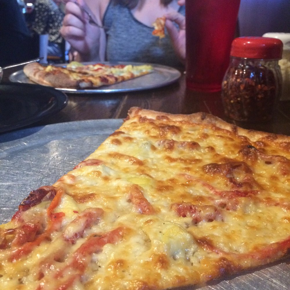 The Post - Our HUGE slices of pizza - Pizza Near Me - Louisville, Kentucky The Post - Our HUGE slices of pizza - Pizza Near Me - Louisville, Kentucky