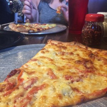 The Post - Our HUGE slices of pizza - Pizza Near Me - Louisville, Kentucky The Post - Our HUGE slices of pizza - Pizza Near Me - Louisville, Kentucky