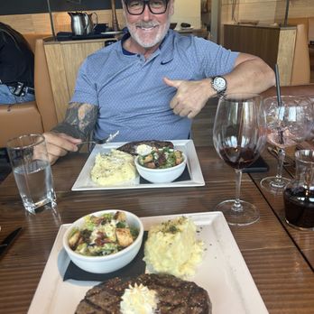The Lodge Steakhouse - Ribeye steak,mashed potatoes and Caesar salad substitute for seasonal veg. Was really good. - Canadian (New) Near Me - Langley, British Columbia
