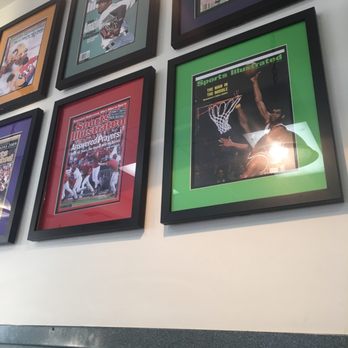 Varsity Burger - Love the sporty decor. Sports illustrated covers on this wall. Other famous athletes and historical sports moments on others. - Burgers Near Me - Anaheim, California Varsity Burger - Love the sporty decor. Sports illustrated covers on this wall. Other famous athletes and historical sports moments on others. - Burgers Near Me - Anaheim, California