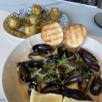 The Goldfinch - $21 MUSCLES in white wine butter sauce & $17 ARTICHOKE hearts with goat cheese - New American Near Me - Irvine, California The Goldfinch - $21 MUSCLES in white wine butter sauce & $17 ARTICHOKE hearts with goat cheese - New American Near Me - Irvine, California