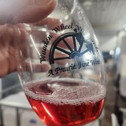Wooden Wheel Vineyards - Working on a fan favorite! Clara's Cranberry.