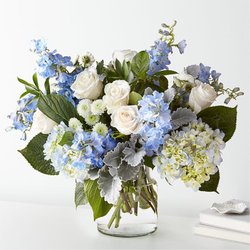 Twigs and Blooms Florist - Let this uplifting arrangement be reminders of the clear skies ahead. Capturing the feeling of hope that a new day brings.