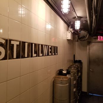 Stillwell Beer Bar - a row of kegs - Bars Near Me - Halifax, Nova Scotia