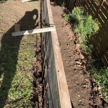 Longhorns Foundation Solutions - Before pouring concrete, he didn't install 2" PVC drainage piles, neither did he leave space for backfilling. - Foundation Repair Near Me Longhorns Foundation Solutions - Before pouring concrete, he didn't install 2" PVC drainage piles, neither did he leave space for backfilling. - Foundation Repair Near Me