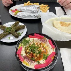 Yaffa Grill & Market - Hummus with pita and grape leaves....always my order when getting Mediterranean food.