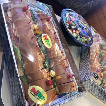 Deli Zone - a variety of sandwiches wrapped in plastic - Caterers Near Me - Farmingdale, New York Deli Zone - a variety of sandwiches wrapped in plastic - Caterers Near Me - Farmingdale, New York