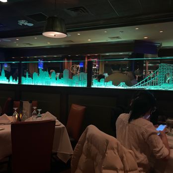 The River Palm Terrace - Bar area seating. - Steakhouses Near Me - Edgewater, New Jersey The River Palm Terrace - Bar area seating. - Steakhouses Near Me - Edgewater, New Jersey