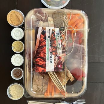 Graze Craze - 2 person picnic. This set also included all the dipping sauces, wooden utensils and a cute honey dipper. - Caterers Near Me - Reno, Nevada Graze Craze - 2 person picnic. This set also included all the dipping sauces, wooden utensils and a cute honey dipper. - Caterers Near Me - Reno, Nevada