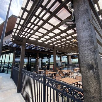 Waters Edge Winery & Bistro - Outside seating. - Wineries Near Me - Richmond, Texas Waters Edge Winery & Bistro - Outside seating. - Wineries Near Me - Richmond, Texas