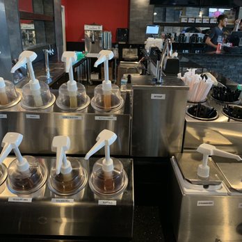Fat Shack - Sauce station- honey mustard is a fave - Chicken Wings Near Me - Fort Worth, Texas