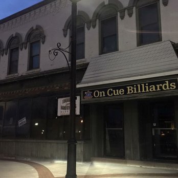 On Cue Billiards - a street light in front of a building - Pool Halls Near Me - Owosso, Michigan On Cue Billiards - a street light in front of a building - Pool Halls Near Me - Owosso, Michigan