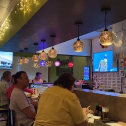 Kevin's Sushi and Thai - Bar that you can eat at. Overall the restaurant only has like 5 tables max. You can pick up take out at the register.