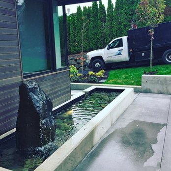 MC Landscape - Need some tranquility? A water feature is an excellent way to quiet city noise. - Landscaping Near Me MC Landscape - Need some tranquility? A water feature is an excellent way to quiet city noise. - Landscaping Near Me
