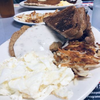 Digger's Diner - Concord - Chicken fried steak with egg whites and hash browns with wheat toast. Blueberry pancakes in the background - Breakfast & Brunch Near Me - Concord, California