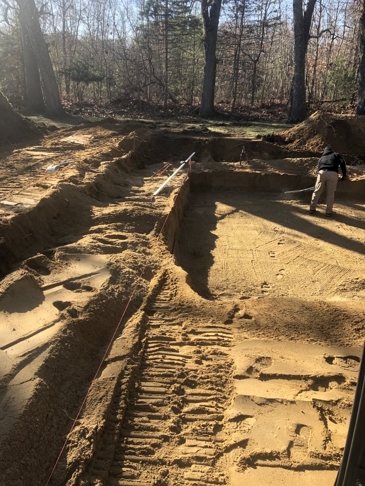 Slide of EmRay Excavating