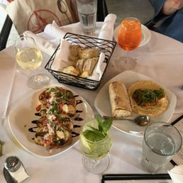Bread basket, bruschetta, chili oil hummus Bread basket, bruschetta, chili oil hummus