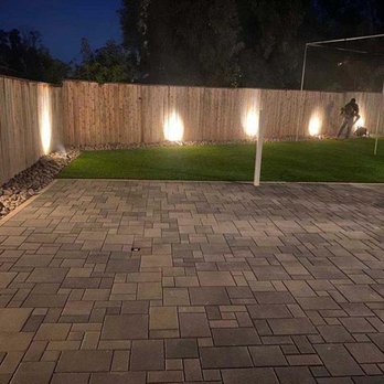 Unique Living Solutions - a brick patio with lights - Landscape Architects or Designers Near Me Unique Living Solutions - a brick patio with lights - Landscape Architects or Designers Near Me