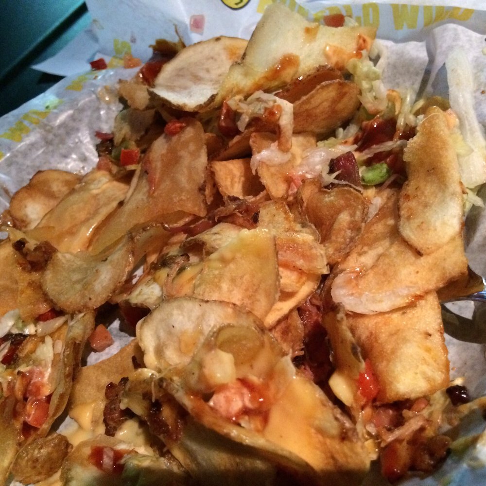 Buffalo Wild Wings - After eating the impressive 1st layer, nothing but chips were left. - Chicken Wings Near Me - Keller, Texas Buffalo Wild Wings - After eating the impressive 1st layer, nothing but chips were left. - Chicken Wings Near Me - Keller, Texas