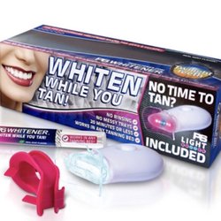 Glow Tanning Studio - Whiten your teeth while you tan !!