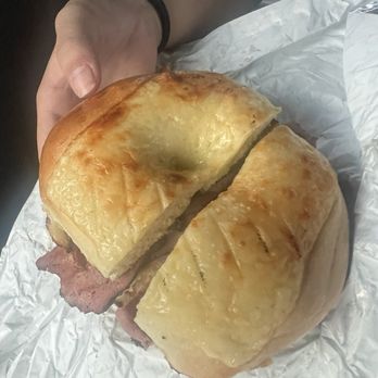 The Bagel Hole - Asiago bagel with pastrami, meat and cheese. - Bagels Near Me - Cumming, Georgia The Bagel Hole - Asiago bagel with pastrami, meat and cheese. - Bagels Near Me - Cumming, Georgia