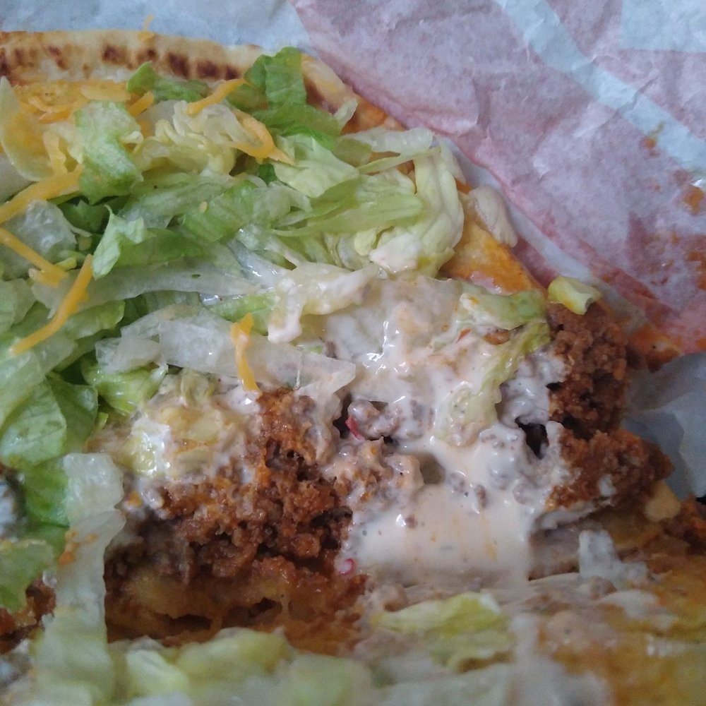 Ranch on the taco that asked to not have ranch. Plain taco not Doritos like I asked. Ranch on the taco that asked to not have ranch. Plain taco not Doritos like I asked.