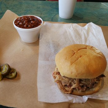 Slap's BBQ - Pull pork sandwich with a side of beans. The mild BBQ sauce is awesome with the sandwich. Must have when you are in town - Barbeque Near Me - Kansas City, Kansas Slap's BBQ - Pull pork sandwich with a side of beans. The mild BBQ sauce is awesome with the sandwich. Must have when you are in town - Barbeque Near Me - Kansas City, Kansas