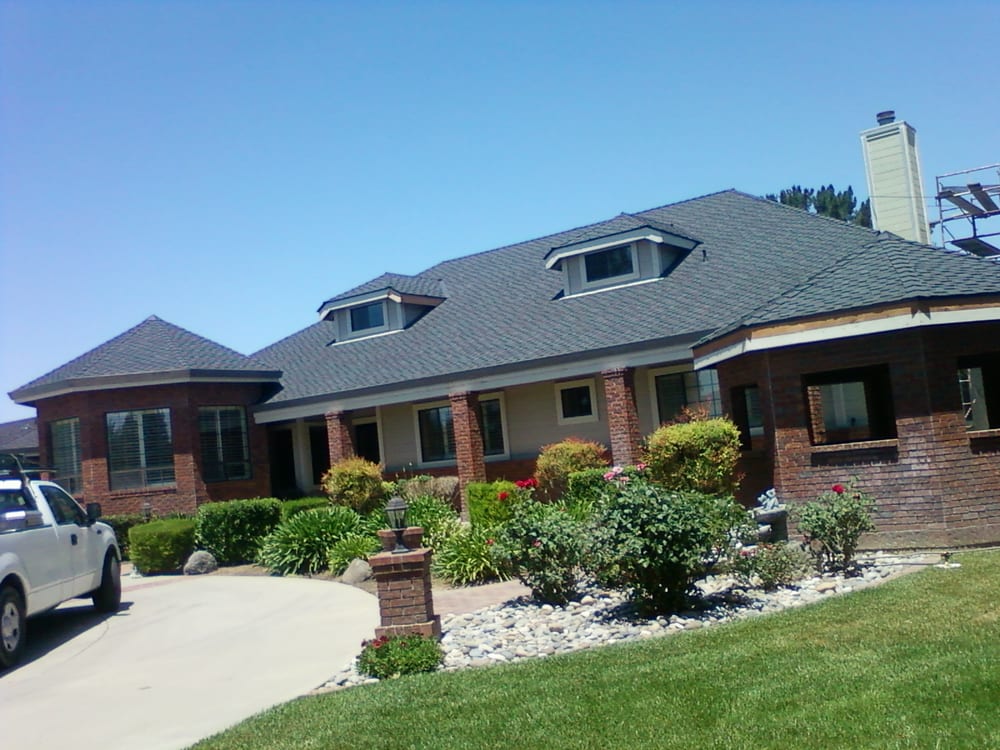 Slide of Landmark Roofing