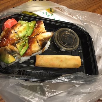Asian House - To go dancing eel roll with spring roll. More appetizing than its presented. Think it all slid to the left. - Sushi Bars Near Me - Titusville, Florida