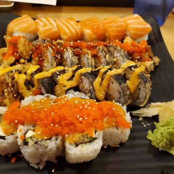 Oishii - I honestly don't know what the order is, but in this picture there is Crazy Sunny Maki, Sumo Maki, Houston Maki, and Volcano Maki - Sushi Bars Near Me - Houston, Texas