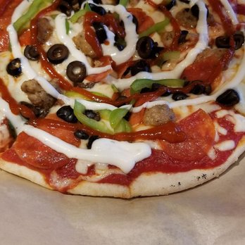 Dells Pizza Lab - Drizzle of ranch and Siracha. - Salad Near Me - Wisconsin Dells, Wisconsin Dells Pizza Lab - Drizzle of ranch and Siracha. - Salad Near Me - Wisconsin Dells, Wisconsin