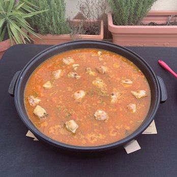Paella Legacy Sevilla - Cooking the paella! - Food Tours Near Me