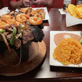 El Tapatio - Molcajete Tarasco with the sides that it comes with - Mexican Near Me - Orlando, Florida El Tapatio - Molcajete Tarasco with the sides that it comes with - Mexican Near Me - Orlando, Florida