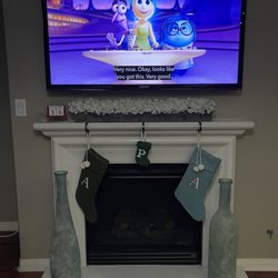 Smart Home Innovators - TV mounted over fireplace. Looks great!