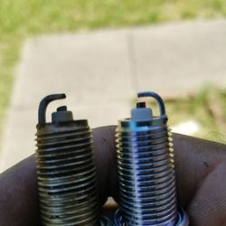 Austin Mobile Automotive - Spark plug with 98k miles on them and a new plug.