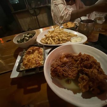 Salty Sow - Honey Crisp Chicken, duck fat fried ff, Brussel sprout leaves, mac n cheese - American Near Me - Austin, Texas