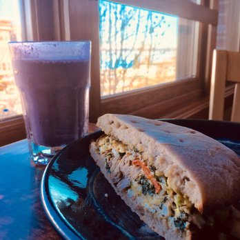 Evolve Chocolate + Cafe - Big portions! This is half of the hearty breakfast sandwich. Great view to enjoy breakfast, with the view of blue skies over the Bay. - Cafes Near Me - Bellingham, Washington