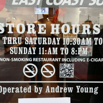 Penn Station - a store hours sign in the window - Sandwiches Near Me - Columbus, Indiana Penn Station - a store hours sign in the window - Sandwiches Near Me - Columbus, Indiana
