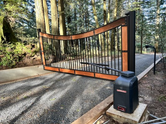 Swing Arc Gate in Woodside - This is a unique style heavy duty materials with redwood wood cover with stain, beautiful!! Swing Arc Gate in Woodside - This is a unique style heavy duty materials with redwood wood cover with stain, beautiful!!