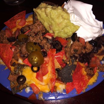 The Standard Station - Happy hour nachos with carne asada - Sports Bars Near Me - El Segundo, California The Standard Station - Happy hour nachos with carne asada - Sports Bars Near Me - El Segundo, California
