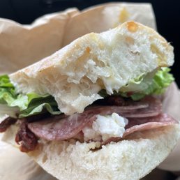 #15 Goat cheese, salami, sun-dried tomato on focaccia bread.