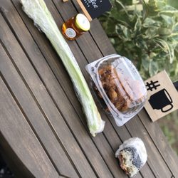 Chings' Punaluu Store - Celery, fried chicken and my partially eaten spam and egg musubi. Great buys including the Sacred Falls Honey!