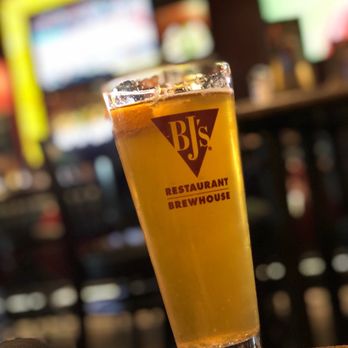 BJ's Restaurant & Brewhouse - a glass of beer - New American Near Me - Bakersfield, California