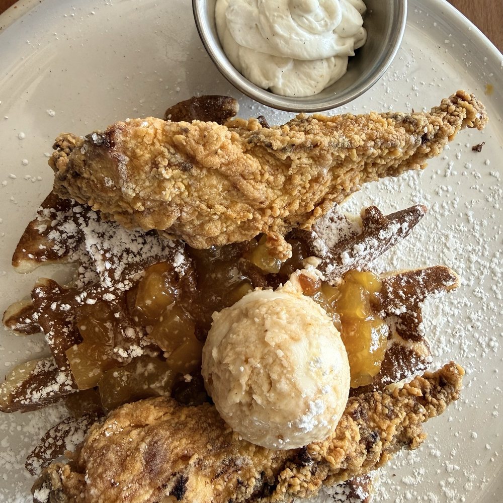 Reef 76 Kitchen & Bar - Chicken and waffles with guava butter and whipped cream - Caribbean Near Me - Fort Lauderdale, Florida Reef 76 Kitchen & Bar - Chicken and waffles with guava butter and whipped cream - Caribbean Near Me - Fort Lauderdale, Florida