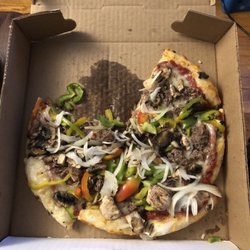 Pizza 1 & Subs 2 - The pizza is tasty but the placing not so much! They put my togo pizza right in cardboard box without any liner!!!!