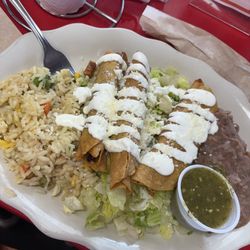 Esther's Authentic Mexican Cuisine - Beef taquitos w rice and beans