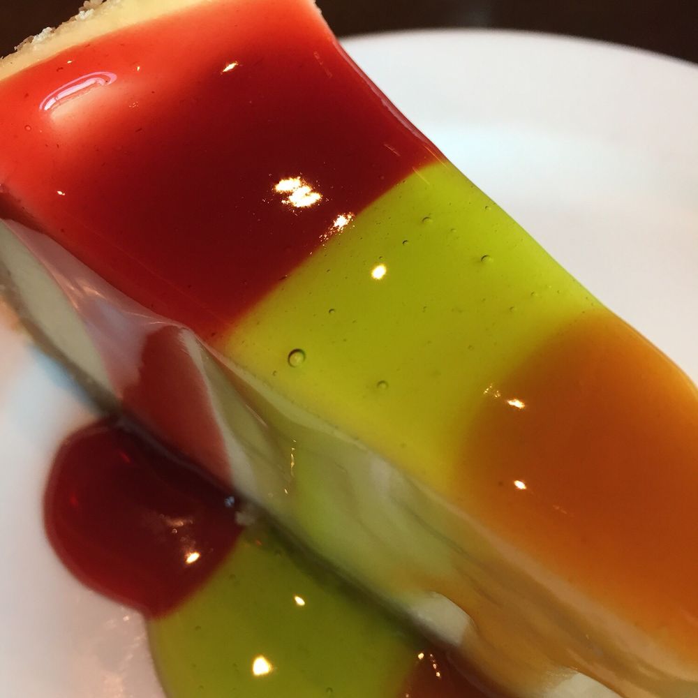 Fire Steakhouse-Wetumpka - Cheesecake with a tri-color drizzle. - Steakhouses Near Me - Wetumpka, Alabama Fire Steakhouse-Wetumpka - Cheesecake with a tri-color drizzle. - Steakhouses Near Me - Wetumpka, Alabama