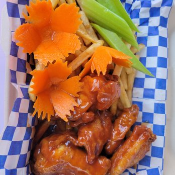 The Mex Mix - a plate of chicken wings and fries - Food Stands Near Me - Richmond, California The Mex Mix - a plate of chicken wings and fries - Food Stands Near Me - Richmond, California