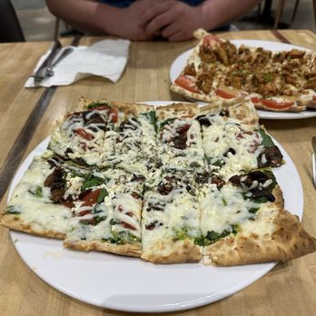 Pita Jungle - Spinach & Pesto Lavash Pizza - Mediterranean Near Me - Phoenix, Arizona Pita Jungle - Spinach & Pesto Lavash Pizza - Mediterranean Near Me - Phoenix, Arizona